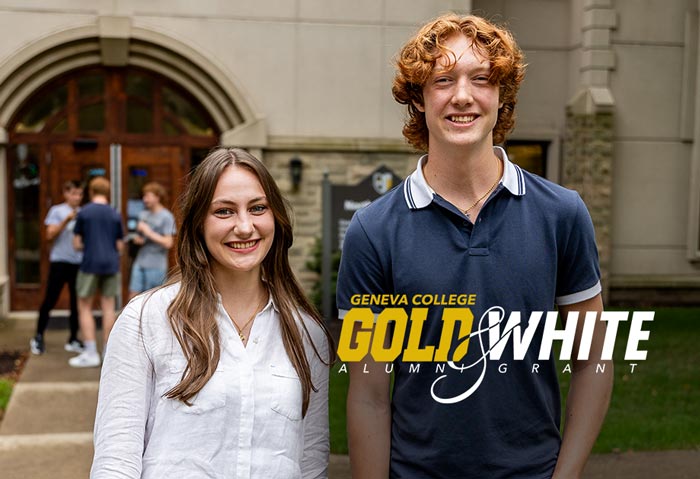 High School students standing and smiling